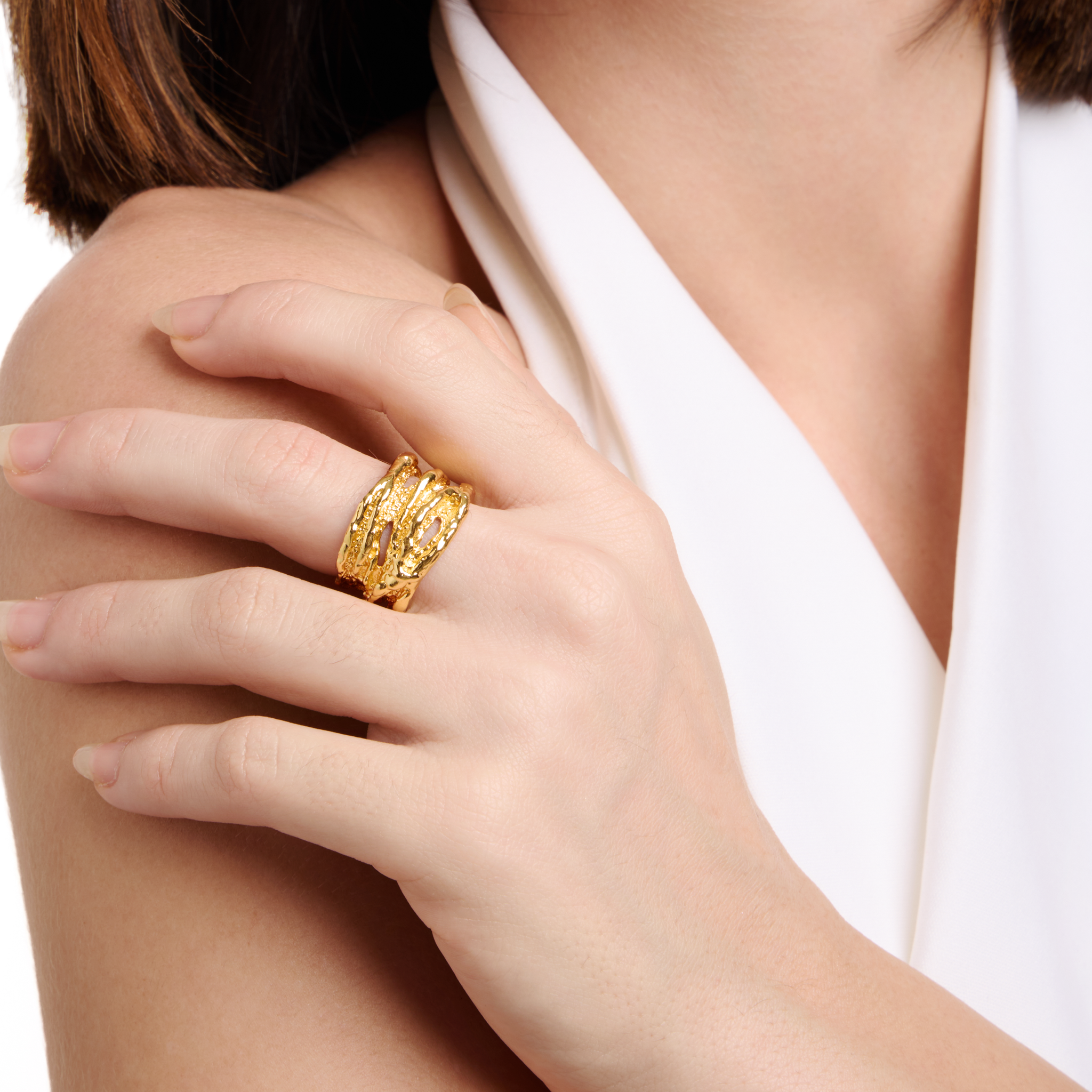 Embrell Becoming Empress Ring in 22K gold-plated finish, handcrafted molten textured statement ring with layered design, demi-fine jewellery worn by a woman for a bold elegant look.