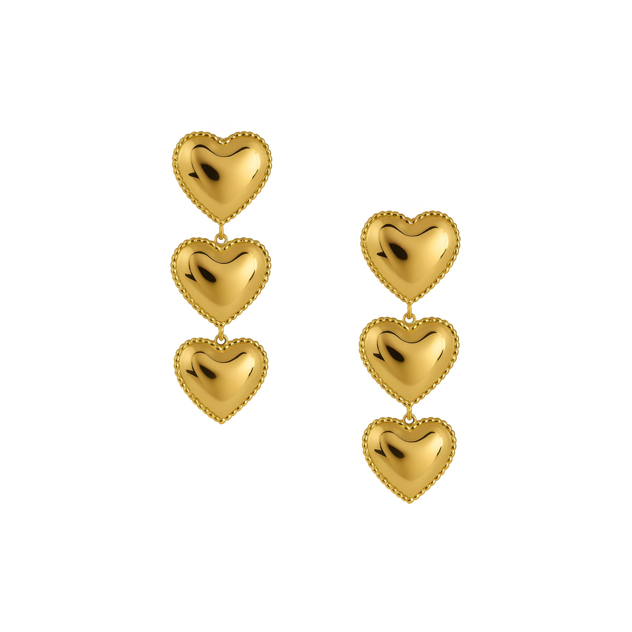 Gold heart-shaped earrings on a white background