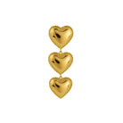 Gold heart-shaped earrings on a white background