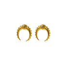 Gold crescent-shaped earring with a central gemstone on a white background