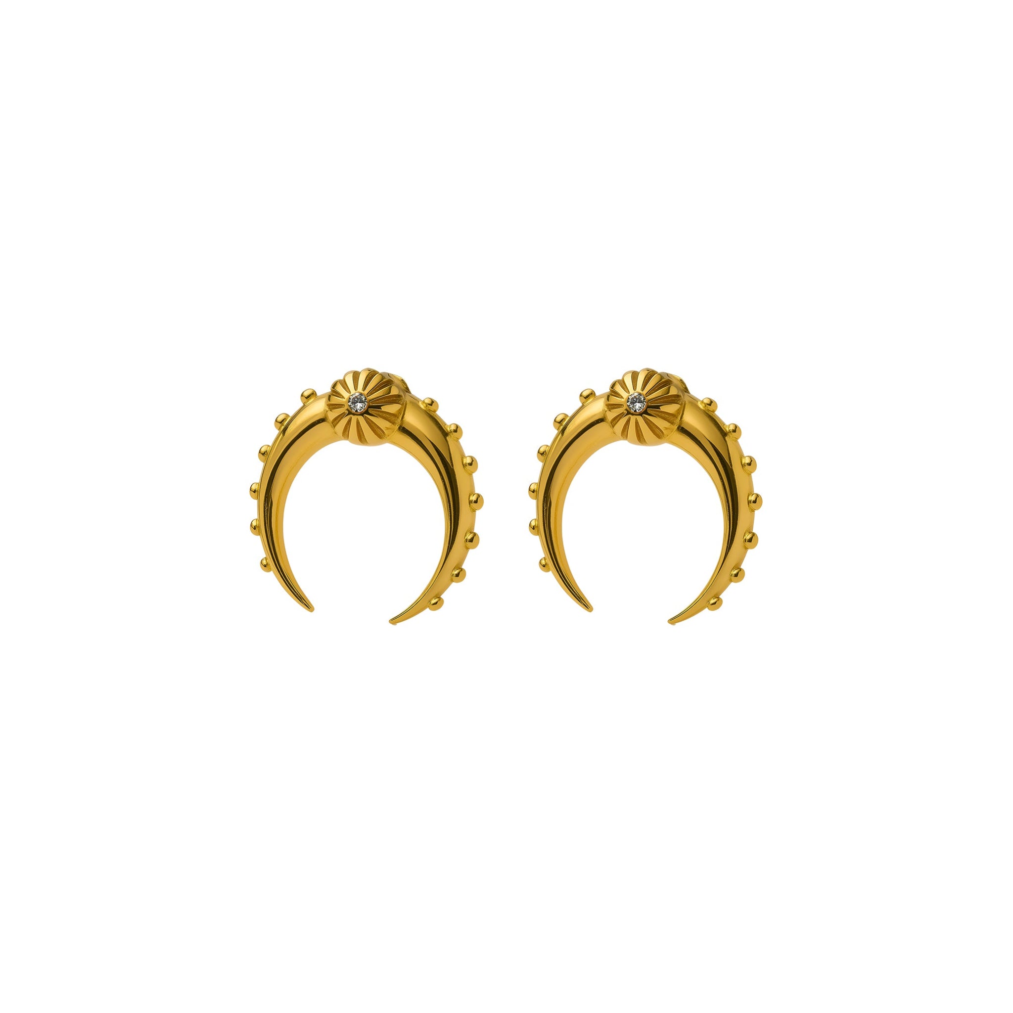 Gold crescent-shaped earring with a central gemstone on a white background