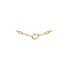 Gold bracelet with abstract-shape and pearls on a white background