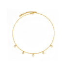 Gold necklace with small diamonds on a white background