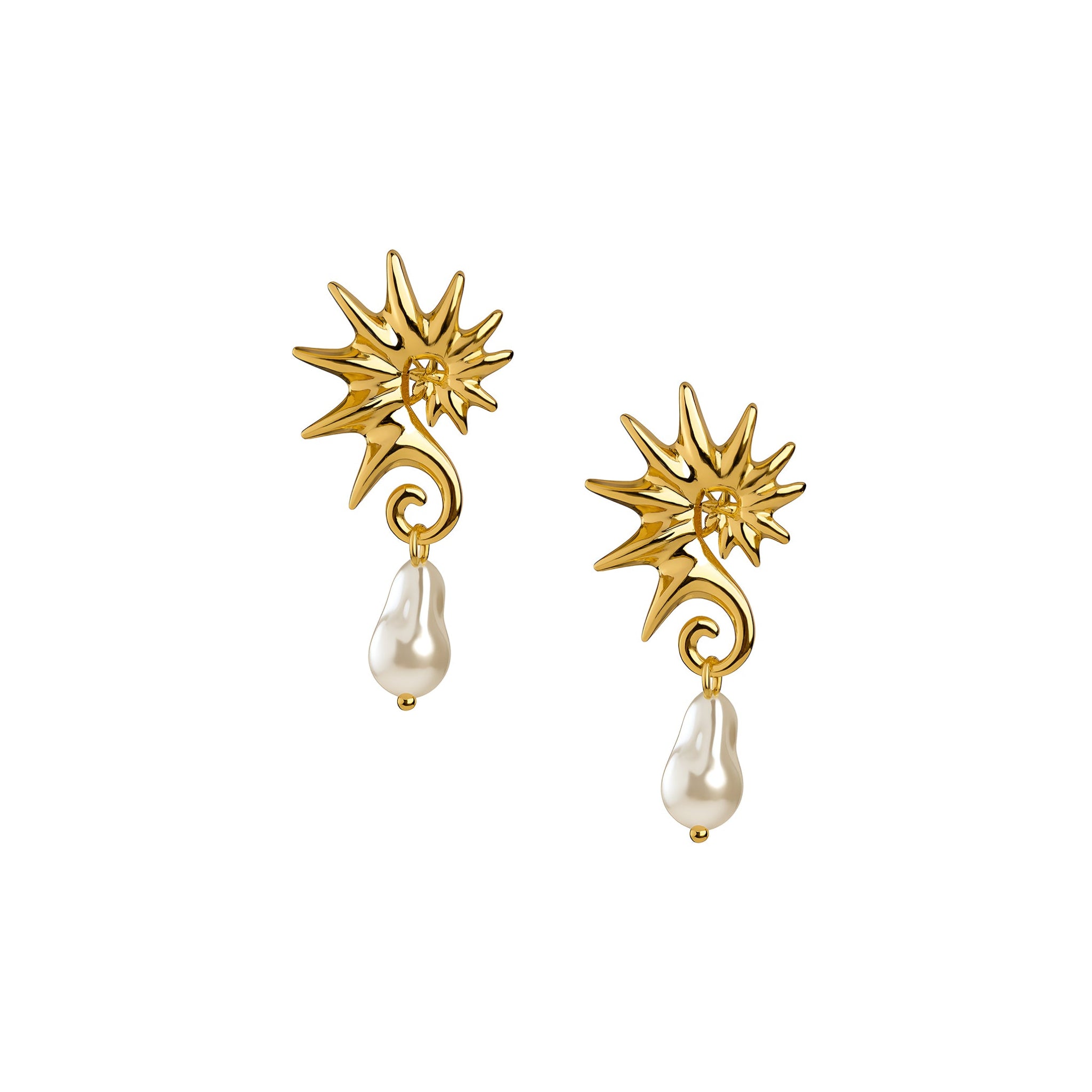 Gold seahorse-shaped earrings with pearl drops on a white background
