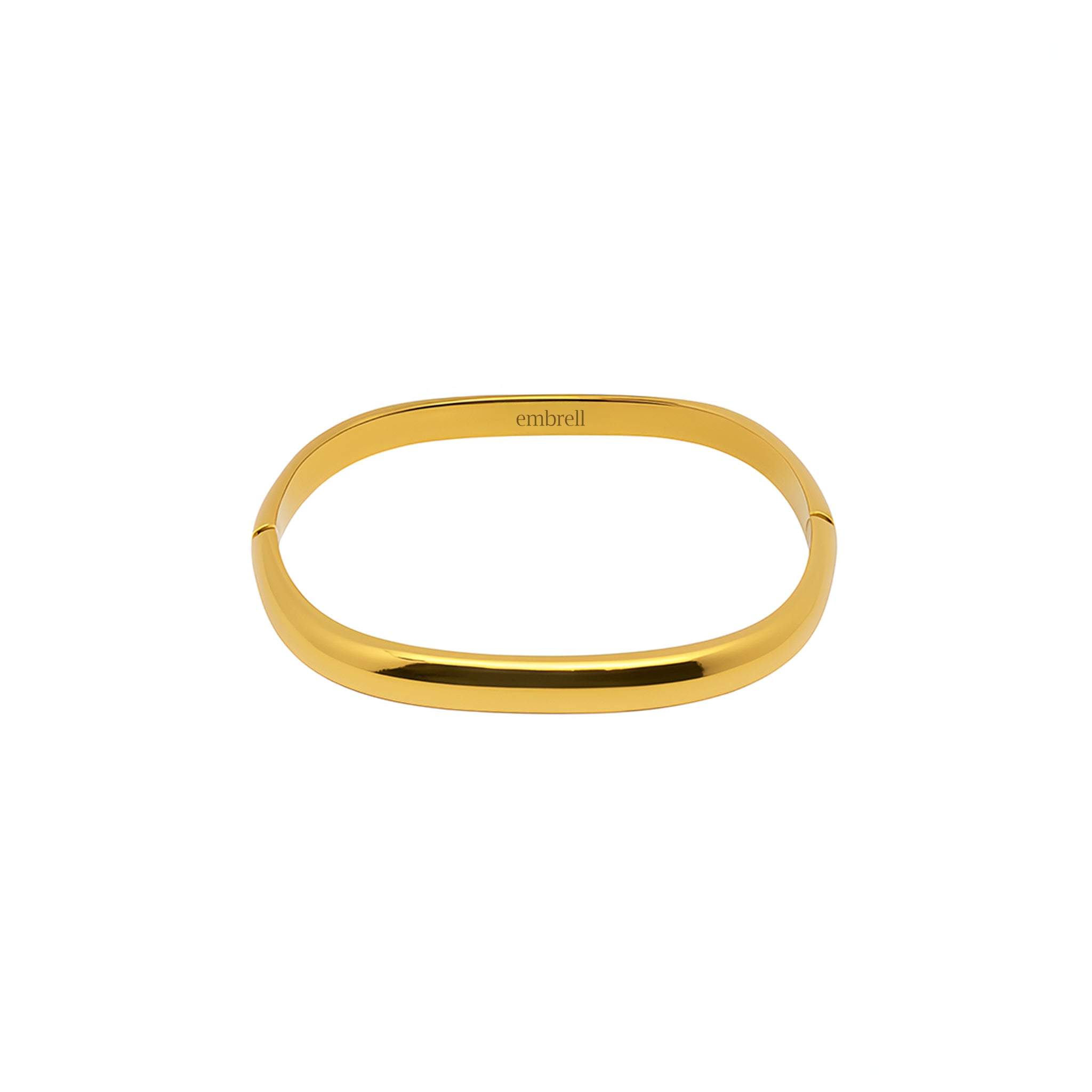 Gold bangle on a white background