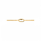 A close-up view of an 18K gold-plated layered necklace featuring two sleek chains and a lock-shaped charm, laid flat against a white background.