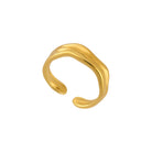 Gold open ring on a white background