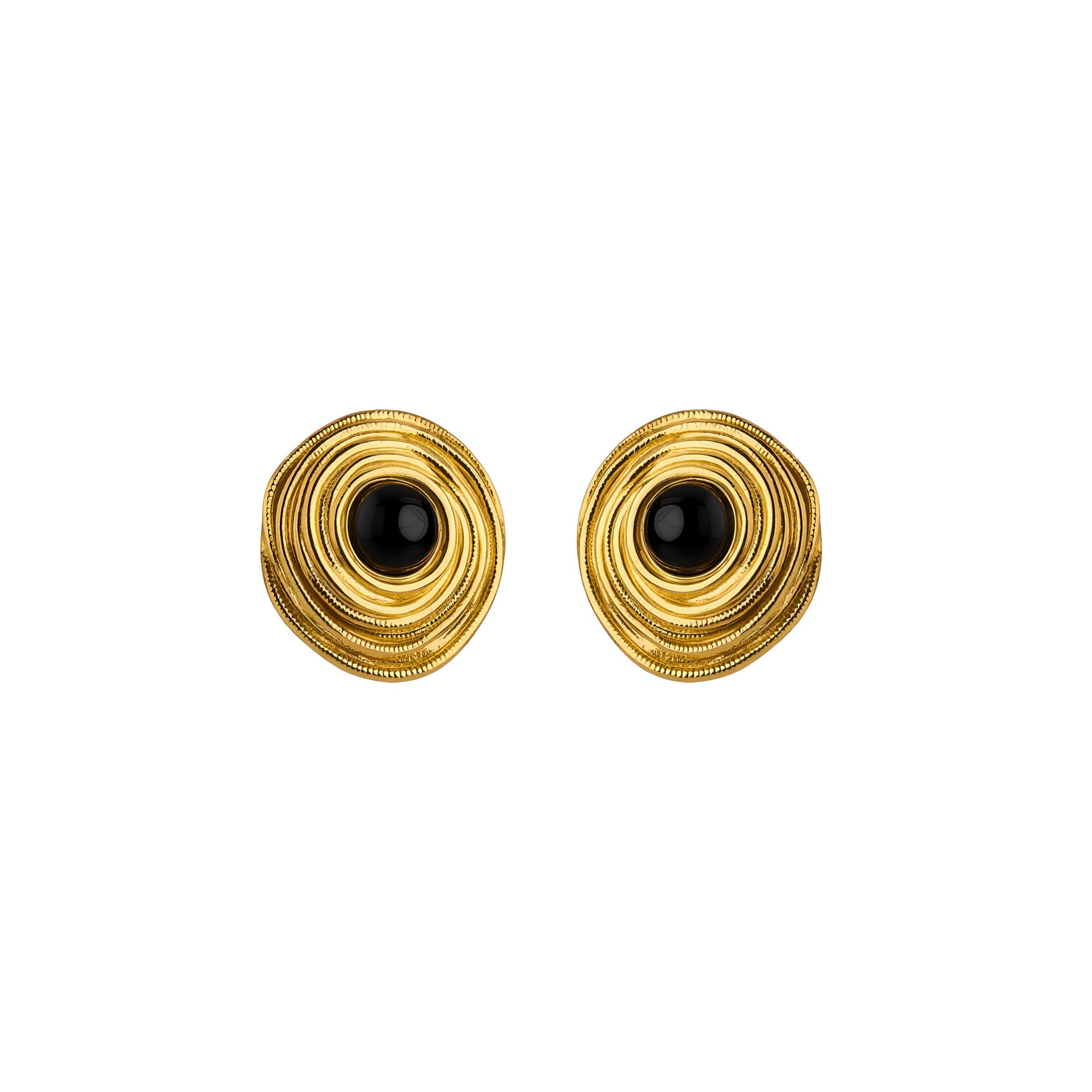 Pair of gold earrings with black centers on a white background