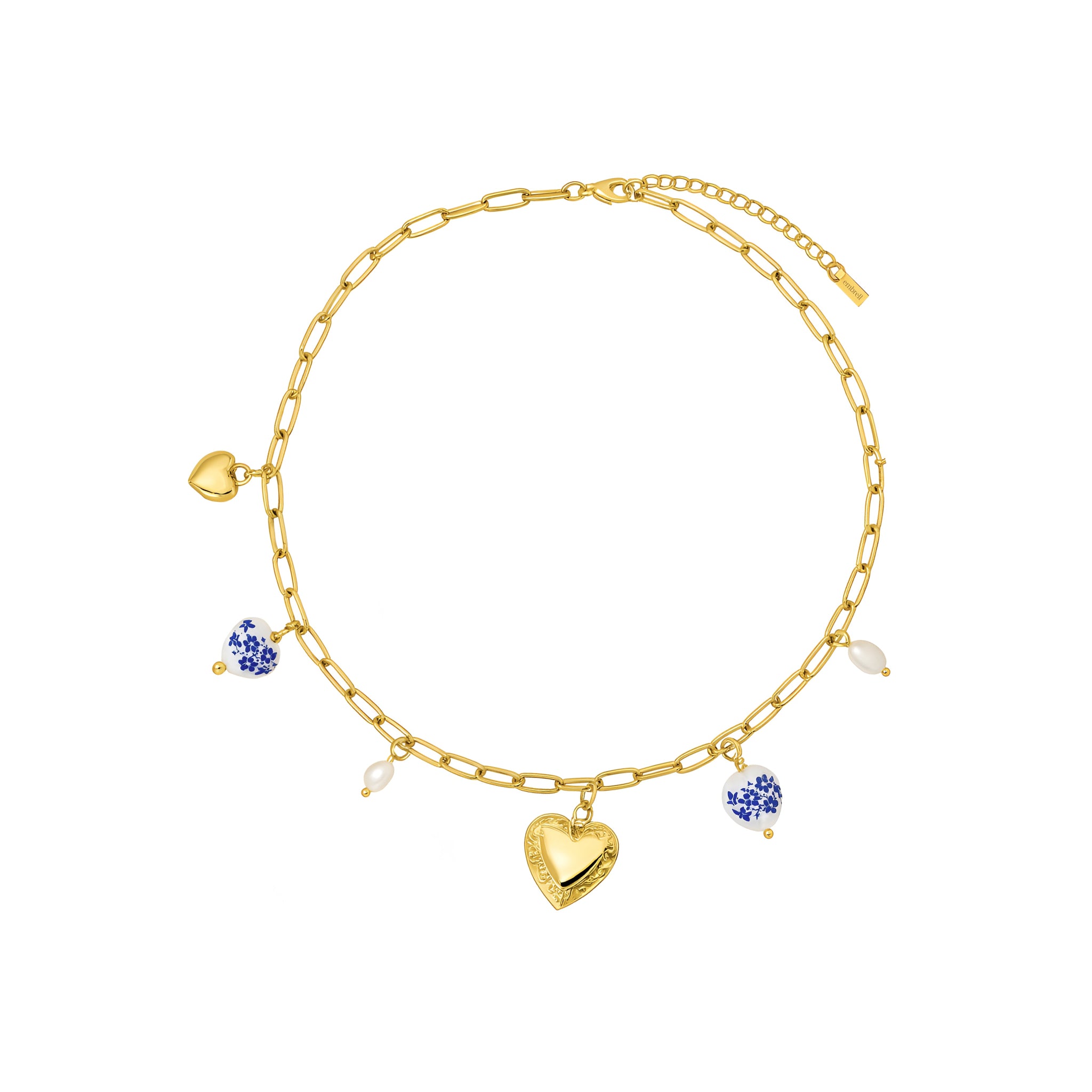 Gold Necklace with heart-shaped charm and small beads on a white background
