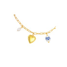Gold chain necklace with heart and floral pendant on a white background