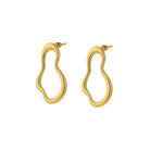 Gold hoop earrings on a white background
