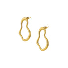 Gold hoop earrings on a white background