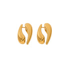 Pair of gold earrings on a white background