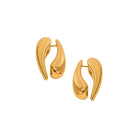 Pair of gold earrings on a white background