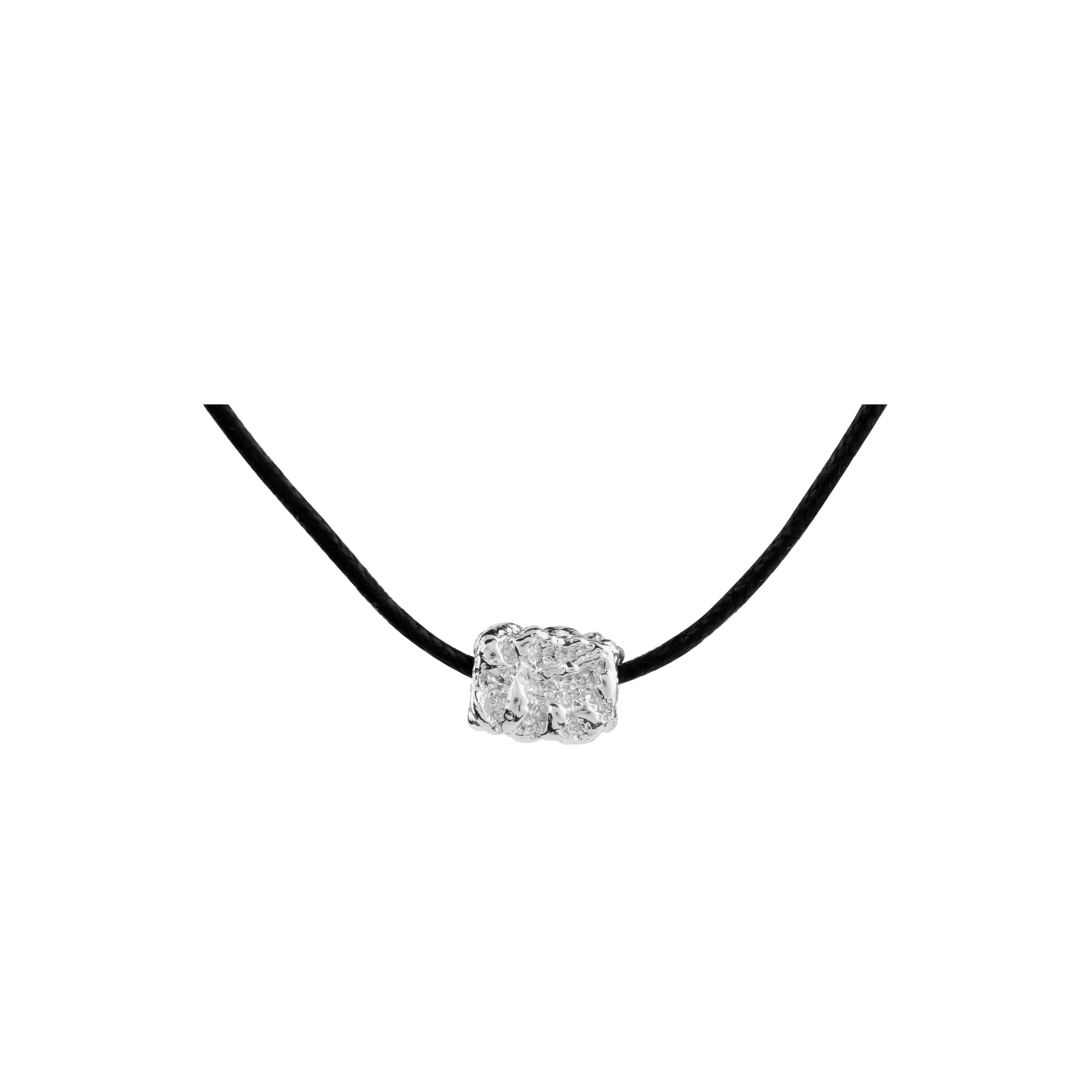 Talisman Necklace, 22K gold plated charm on adjustable black cord.